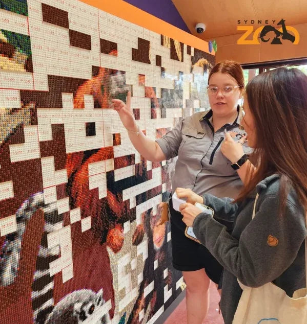 Crowd building a mosaic at an event